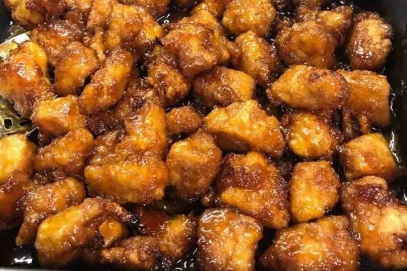 Baked Sweet and Sour Chicken: Crispy breaded chicken baked to perfection, served with a sweet and tangy sauce, perfect for a weeknight dinner or a special occasion.