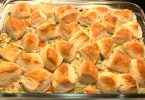 Chicken Pot Pie Bubble-Up Bake: A delicious and comforting casserole dish made with shredded chicken, mixed vegetables, and a flaky biscuit topping, perfect for a weeknight dinner or a comforting family lunch.