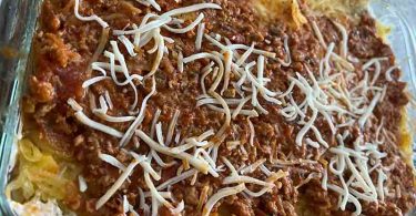 Million Dollar Spaghetti Casserole Recipe: A cheesy and delicious casserole dish made with spaghetti, ground beef, and cheese, perfect for a weeknight dinner or a potluck.