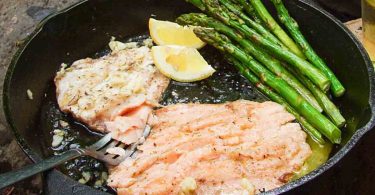 Salmon with Asparagus and Garlic Lemon Butter Sauce: Fresh and succulent salmon fillet paired with tender asparagus and a rich and flavorful garlic lemon butter sauce, perfect for a healthy and delicious dinner