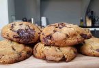Delicious and chewy chocolate chip cookies, golden brown and loaded with chocolate chips.