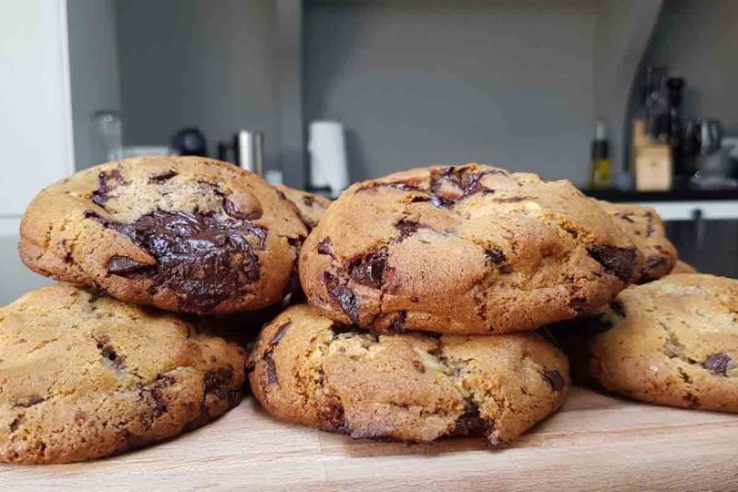 Delicious and chewy chocolate chip cookies, golden brown and loaded with chocolate chips.